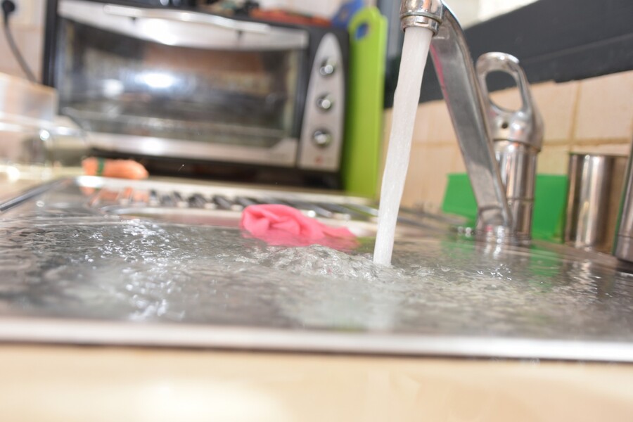 Sink overflowing due to clogged drain ... call Saylor Grace Plumbing for drain cleaning.